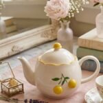 Théière et tasse en céramique citron